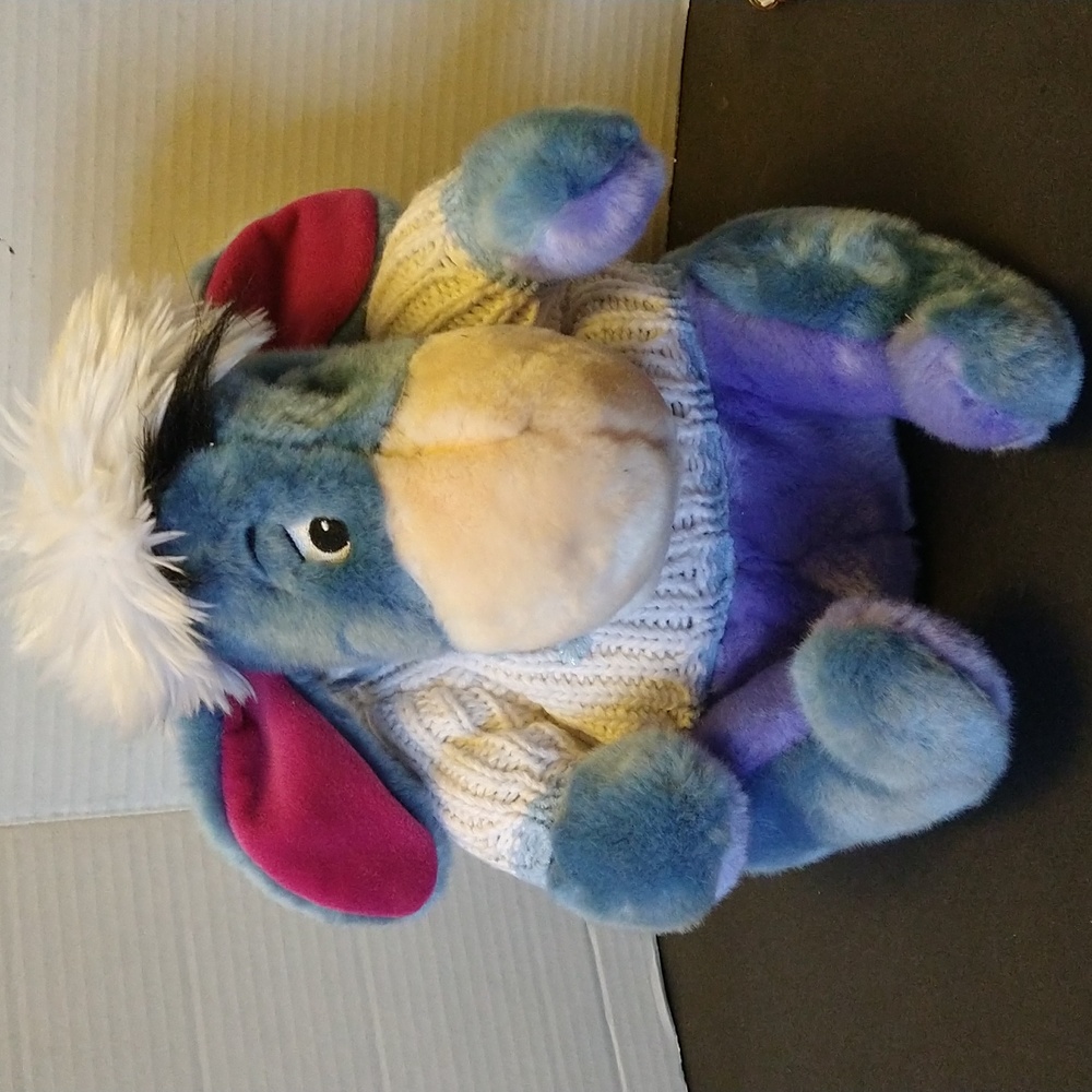 VGUC. Disney store exclusive Winnie the Pooh Eeyore snowflake plush stuffed toy.